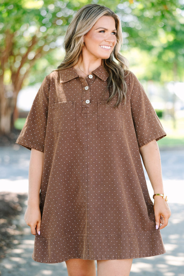 Plus Size brown short sleeve polo dress with white polka dots, collar, and front pockets.