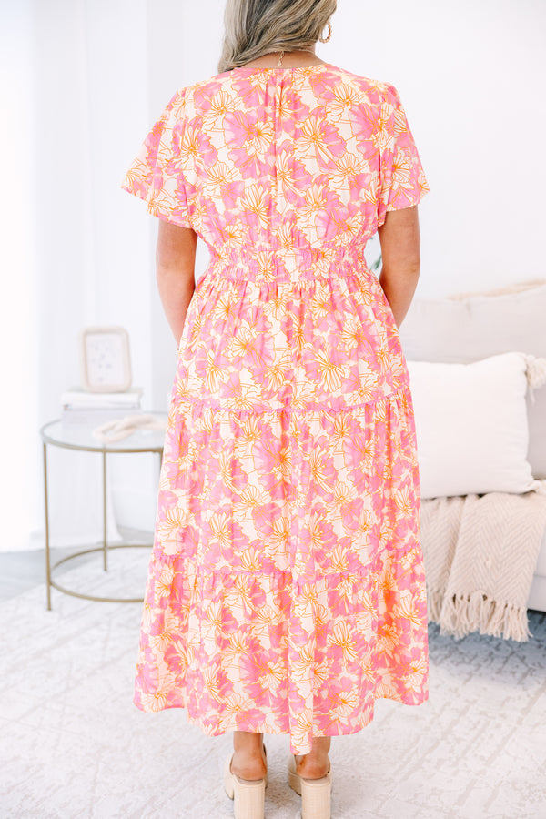 Plus Size pink and orange floral print midi dress with a V-neckline and tiered skirt.