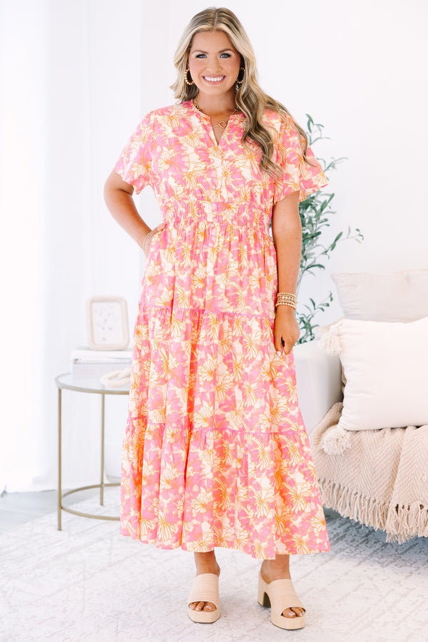 Plus Size pink and orange floral print midi dress with a V-neckline and tiered skirt.