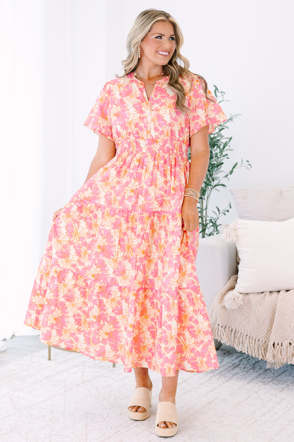 Plus Size pink and orange floral print midi dress with a V-neckline and tiered skirt.