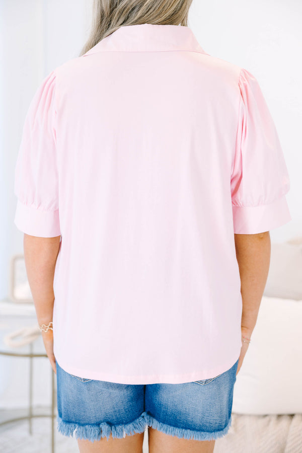 Plus Size powder pink short puff sleeve top with a collared v-neckline.