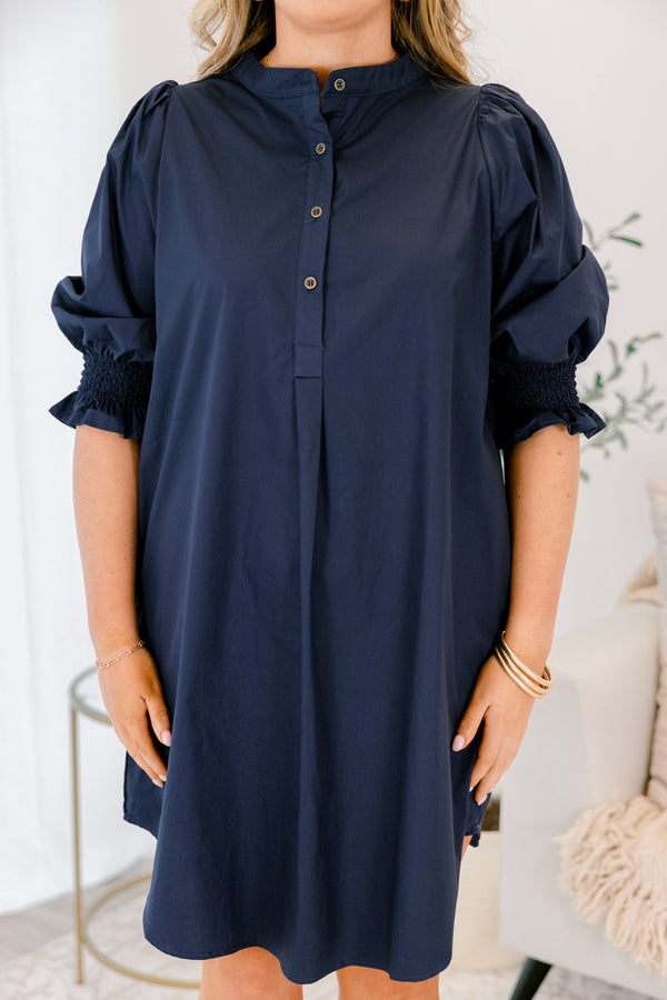 Chic Soul plus size clothing, navy knee length dress with half sleeves that have a ruffle detail at the end of each sleeves and buttons going down to the chest area 