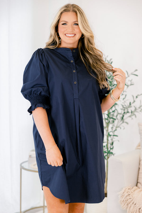Chic Soul plus size clothing, navy knee length dress with half sleeves that have a ruffle detail at the end of each sleeves and buttons going down to the chest area 