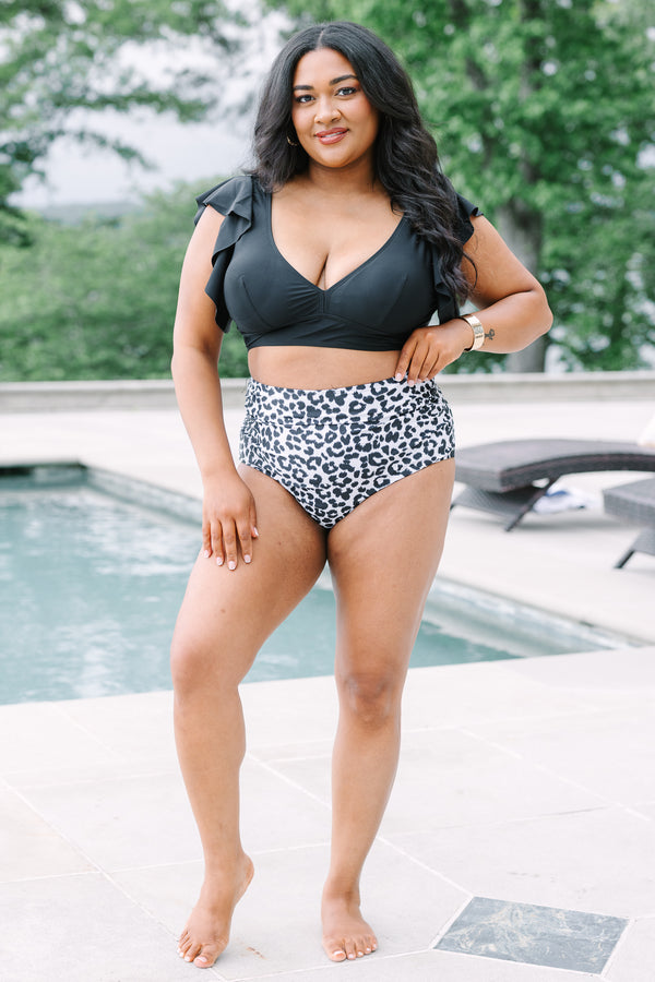 Plus Size high-waisted swim bottoms in a black and white leopard print.