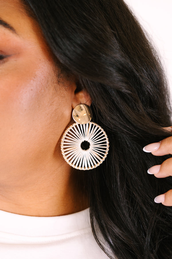 Chic Soul plus size clothing, gold statement earrings featuring a round stud top with a large circular drop design made of radiating white thread details, creating a sunburst pattern.