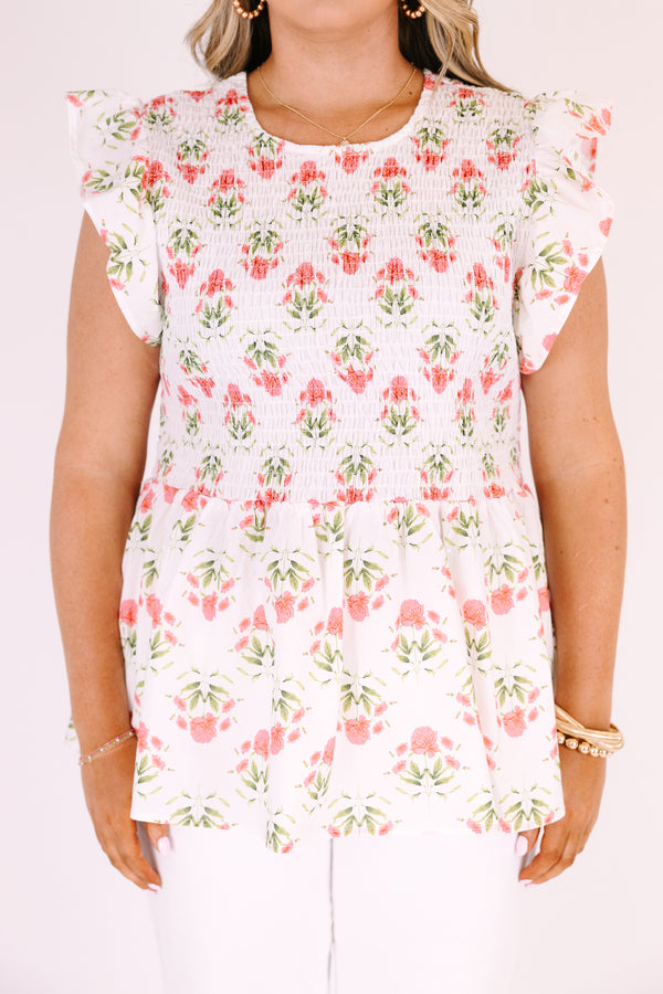 Chic Soul plus size clothing, ivory top with flutter sleeves and a smocked texture on the chest area as well as a pink floral block pattern 