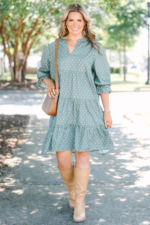 Plus Size green babydoll dress with a split v-neck, mini bell sleeves, and a floral polka dot print.