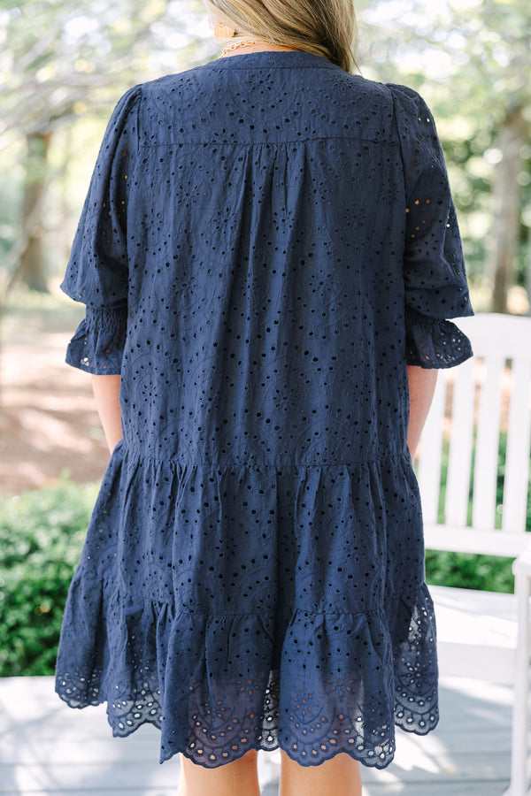 Chic Soul plus size clothing, navy mid sleeve short dress with eyelet design throughout the dress, tiered skirt, v-neckline, and cinching on the bottom of the sleeves