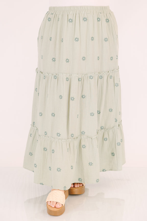 Chic Soul plus size clothing, green tiered maxi skirt with a stretchy waistband and darker green embroidered floral pattern throughout 