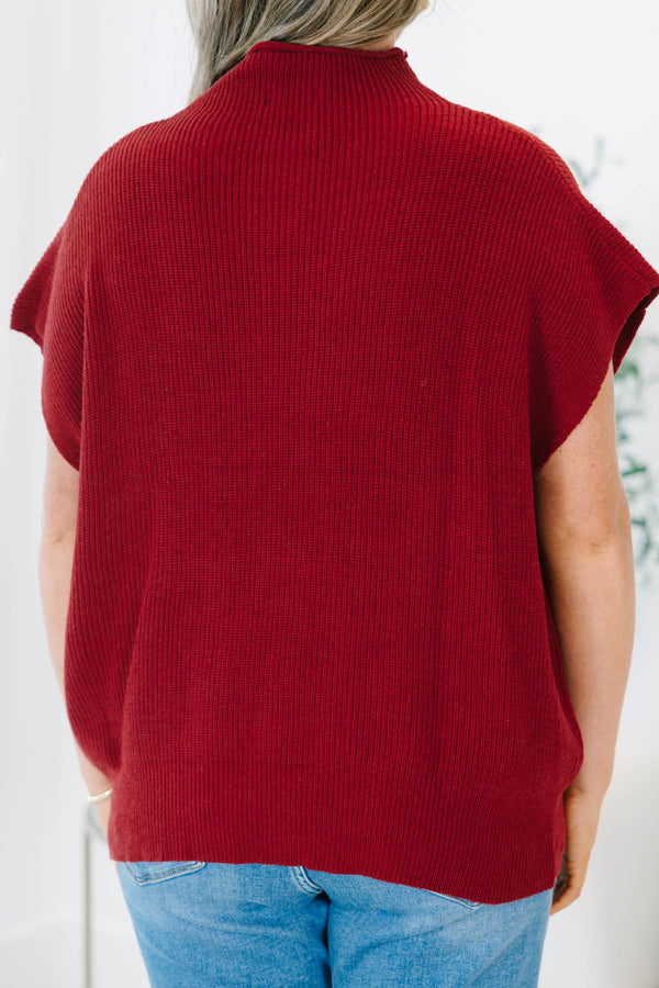 Plus size wine red mock neck sweater with cap sleeves and a relaxed knit fit.