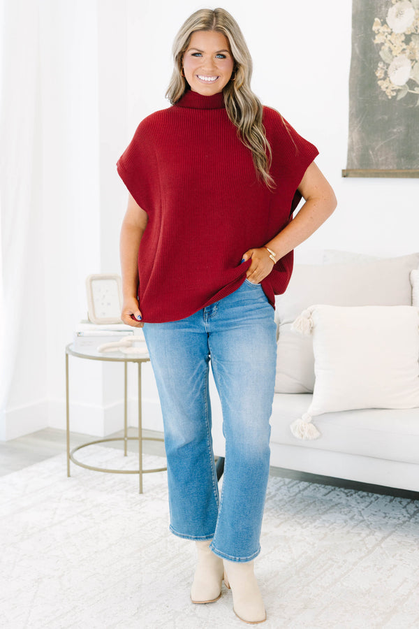 Plus size wine red mock neck sweater with cap sleeves and a relaxed knit fit.