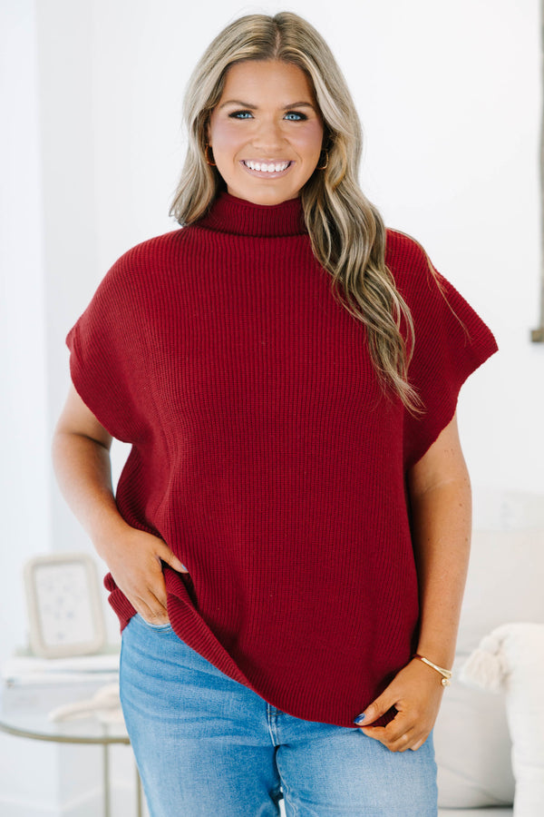 Plus size wine red mock neck sweater with cap sleeves and a relaxed knit fit.