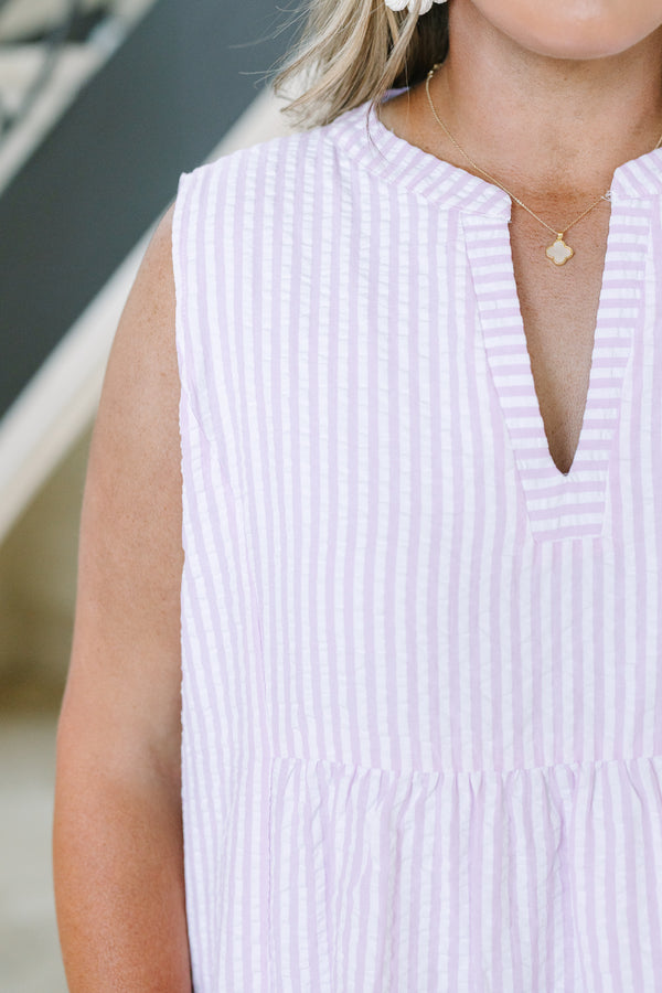 Sleeveless v-neck babydoll dress with tiered colorblock stripes in lavender, pink, and yellow.