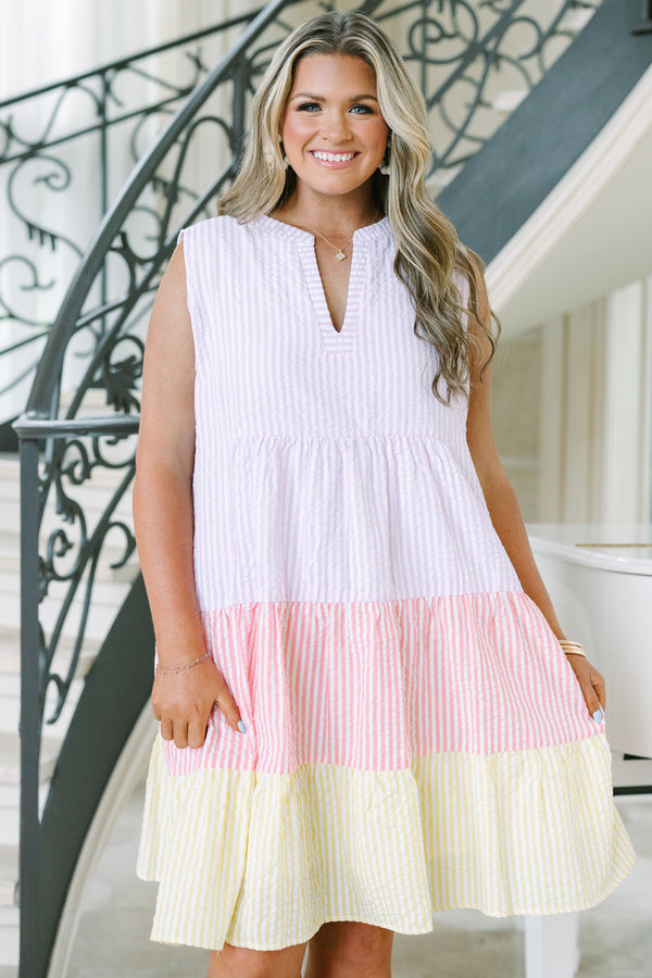Sleeveless v-neck babydoll dress with tiered colorblock stripes in lavender, pink, and yellow.