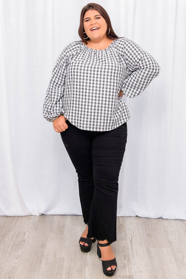 Plus Size charcoal and white gingham blouse with a gathered neckline and long puff sleeves.