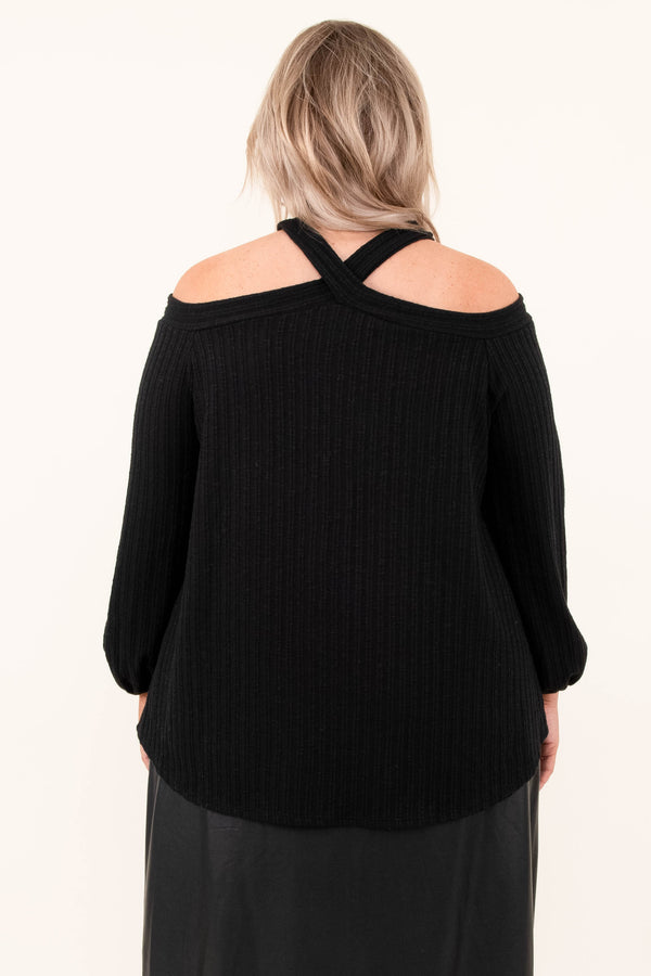 Plus Size black cold-shoulder sweater with a halter neckline and a black faux leather midi skirt.