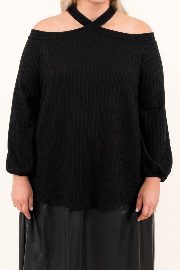 Plus Size black cold-shoulder sweater with a halter neckline and a black faux leather midi skirt.