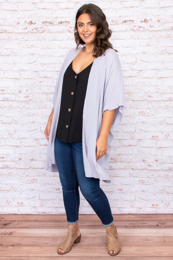 Plus Size grey open-front kimono with oversized fit and wide sleeves over a black button-up top.