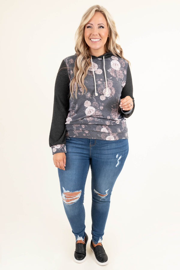 Plus Size medium wash distressed skinny jeans with ripped knees and frayed hems.