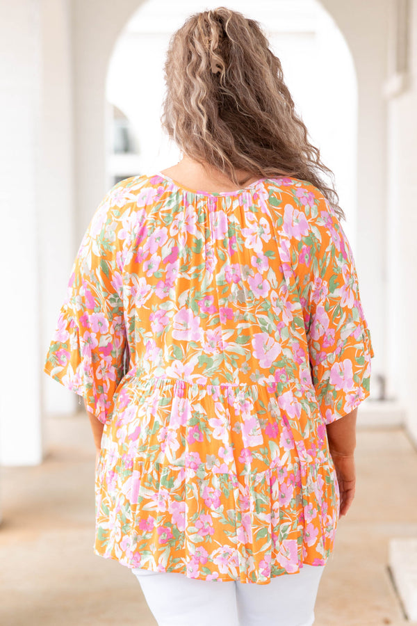 Chic Soul plus size clothing, orange babydoll style top with floral pattern