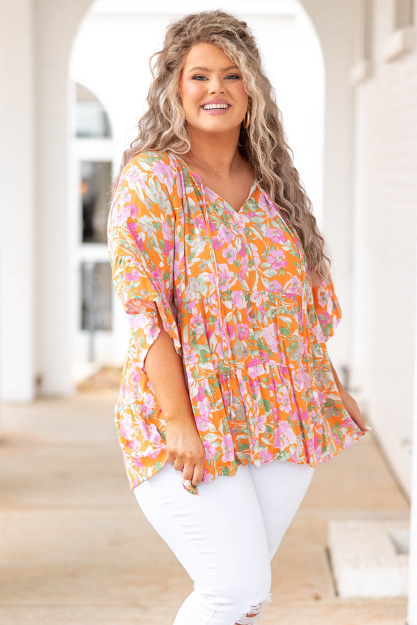 Chic Soul plus size clothing, orange babydoll style top with floral pattern
