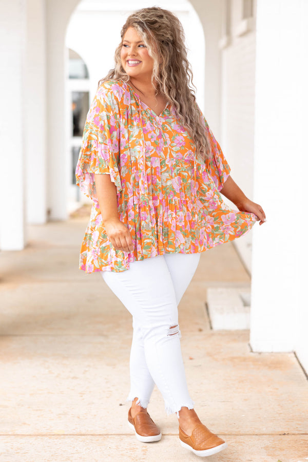 Chic Soul plus size clothing, orange babydoll style top with floral pattern