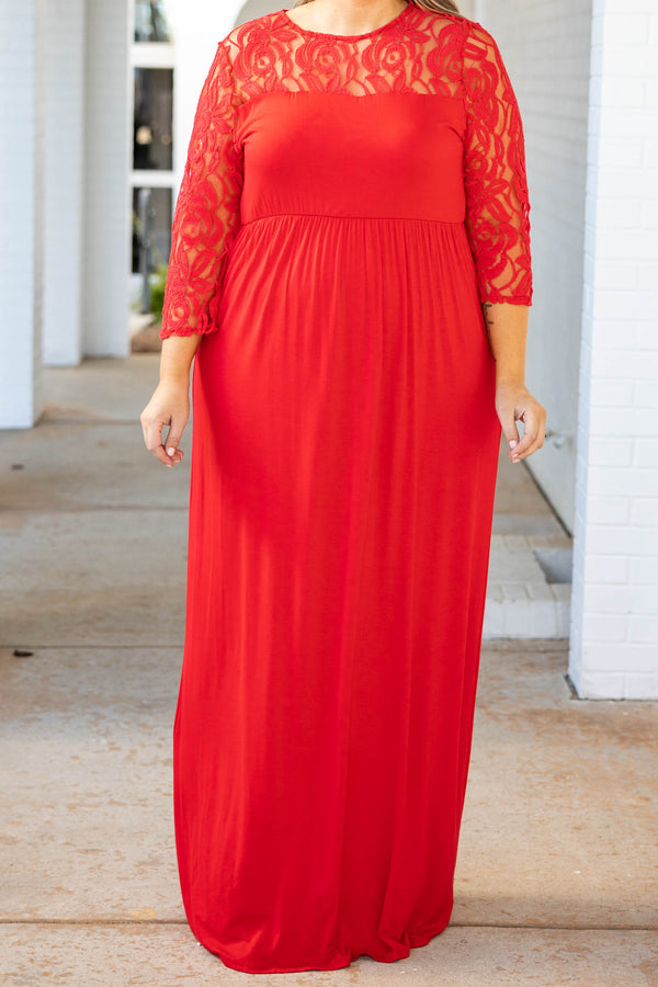 Plus Size red maxi dress with a fitted bodice, long lace sleeves, and a flowing floor-length skirt.
