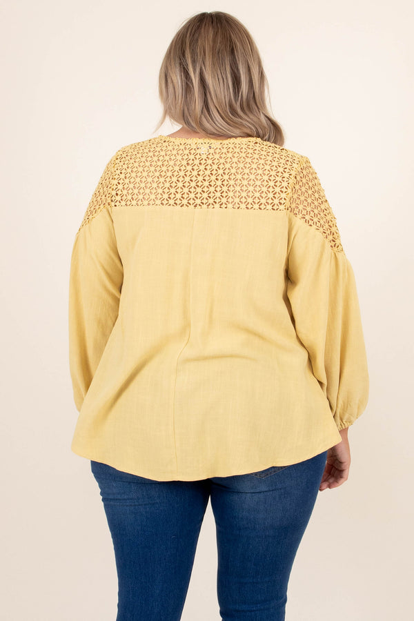 Plus Size marigold linen-blend top with lace crochet yoke, V-neckline, and long balloon sleeves.