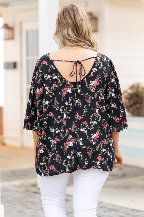 Chic Soul plus size clothing, black top with floral pattern and open tie back