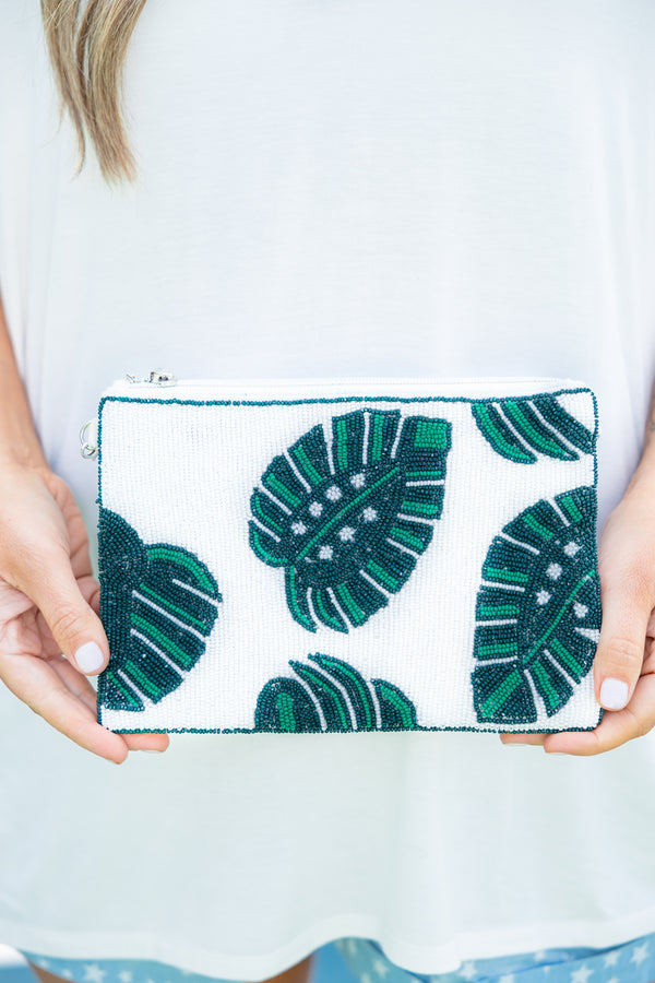 Plus Size white beaded clutch with green tropical leaf patterns and a top zipper closure.